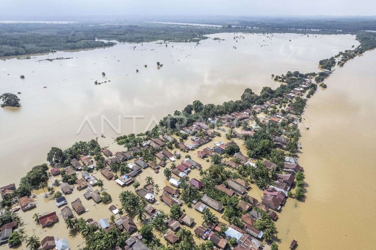 Luapan River Rodhari soak thousands of houses