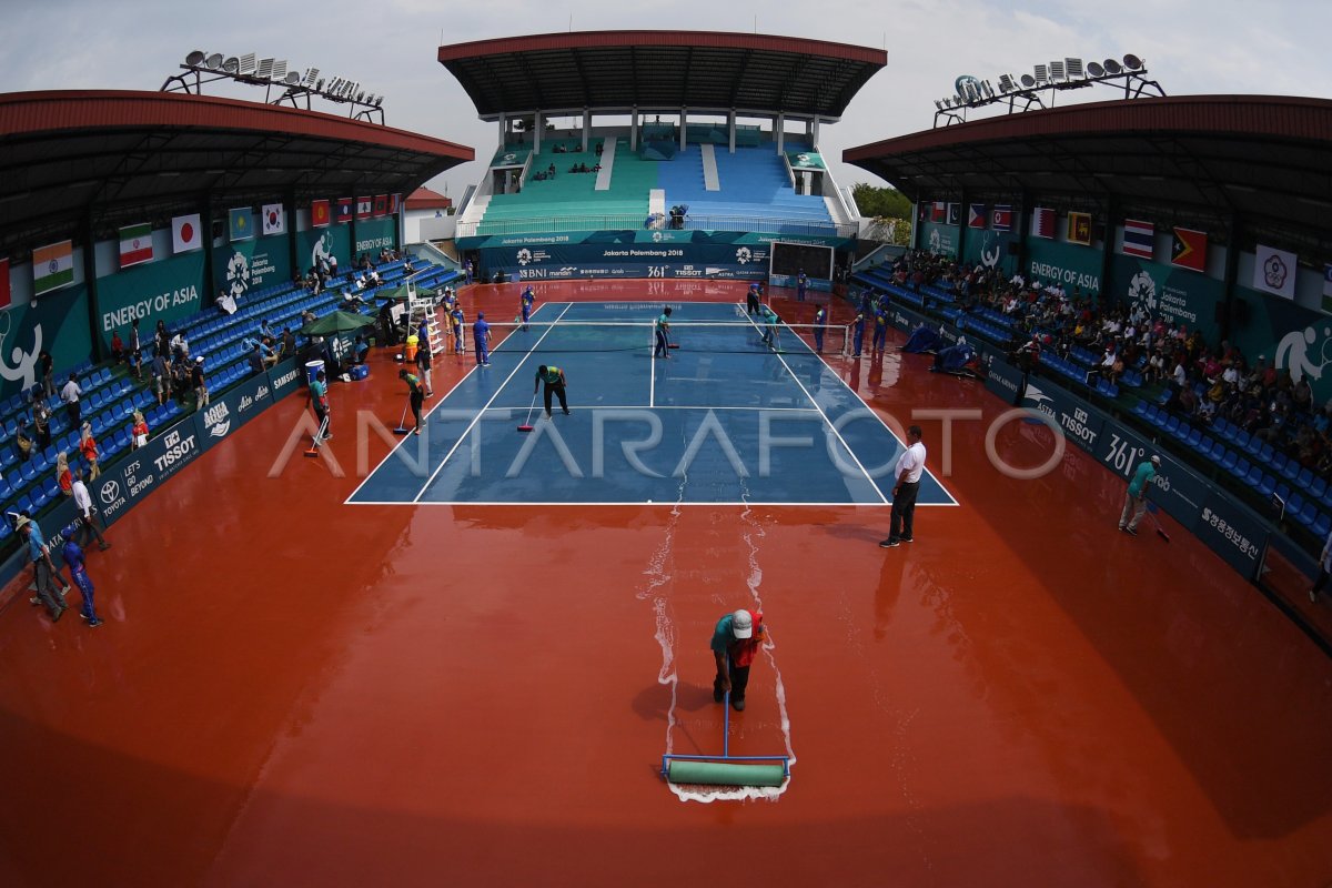 TENNIS - CHAMP PLUVIEUX