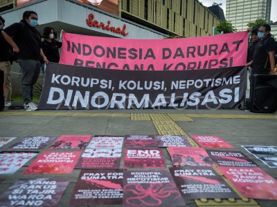 Aksi memperingati Hari Anti Korupsi Sedunia