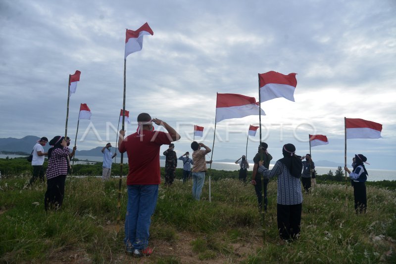 Pengibaran Bendera Di Bukit Pengolahan Sampah Pantai 